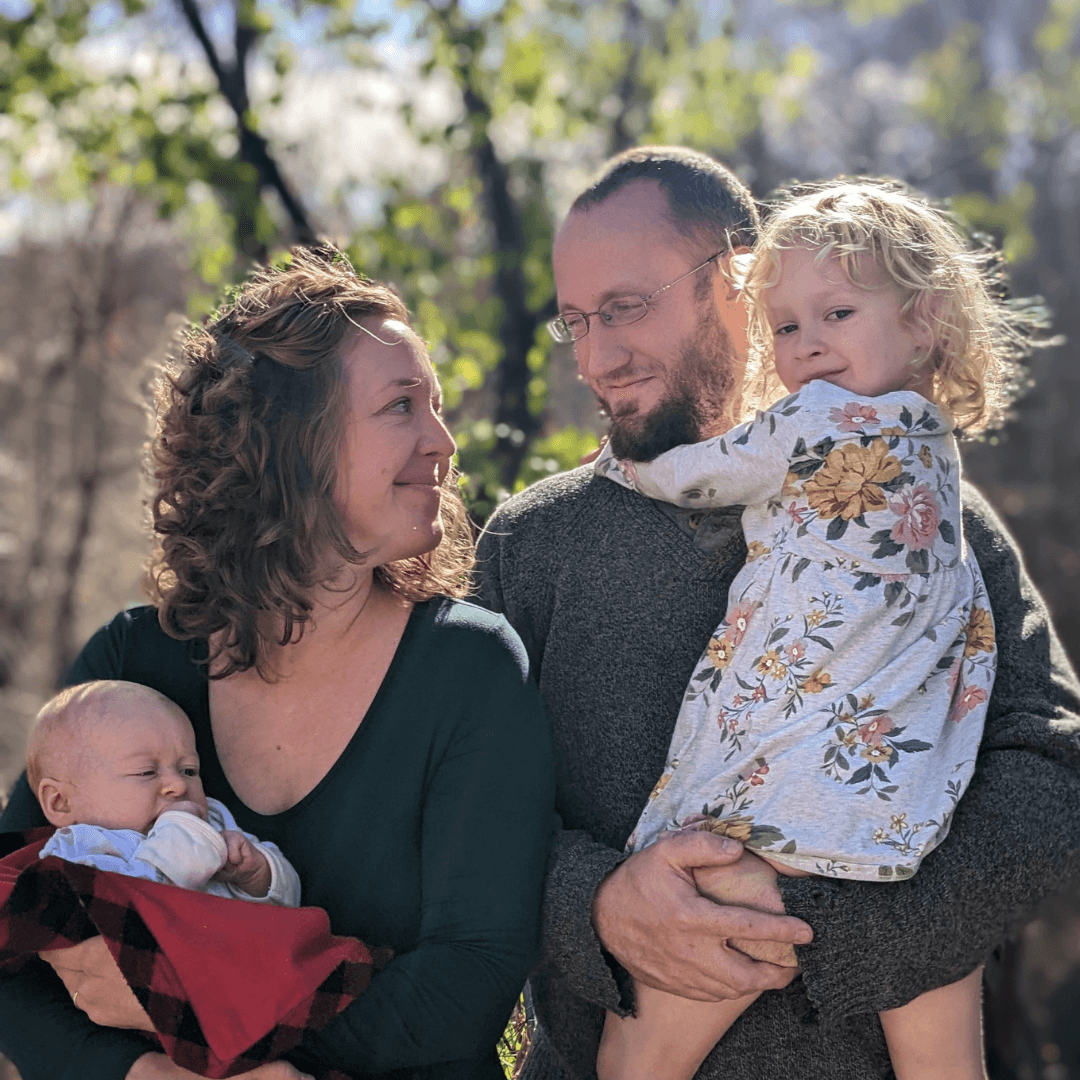 A family picture of a man, woman and two small children from the blog Maxon Made - Resourceful Living