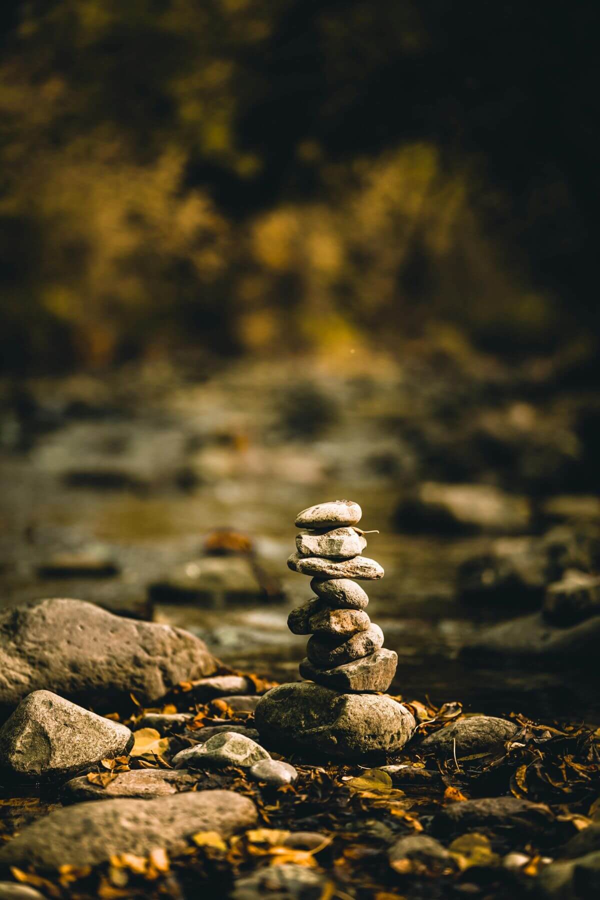 A stack of balanced rocks, reminding  all women that If You Are Wanting Another Baby After Loss but Feel Afraid to stay strong and balanced. 