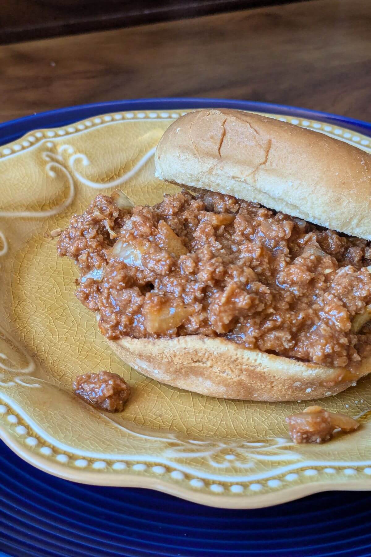 Midwestern tavern sandwich with loose meat filling on a hamburger bun