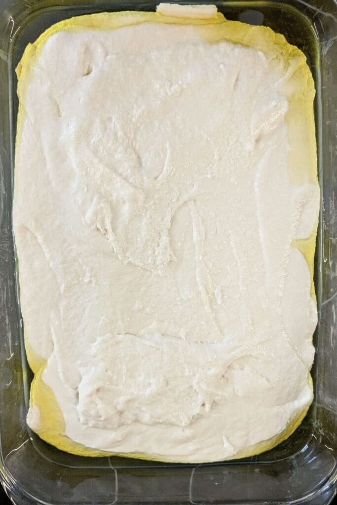 Let this no-knead, same day, simple focaccia dough rise all day in the baking pan - no stretch-and-folds needed.