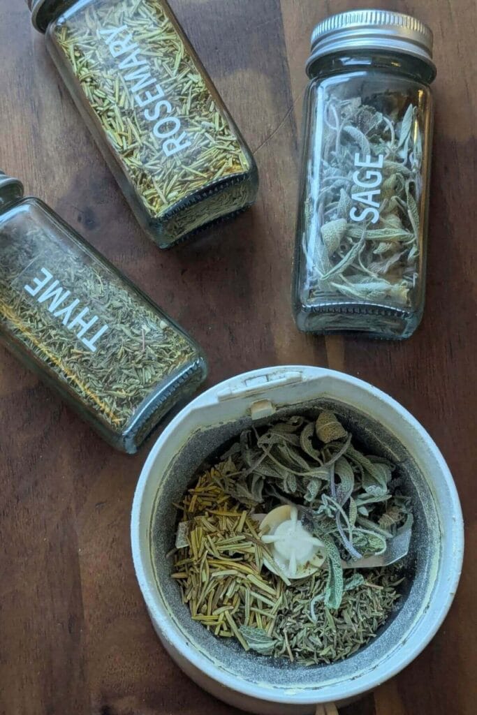 whole herbs in a coffee grinder